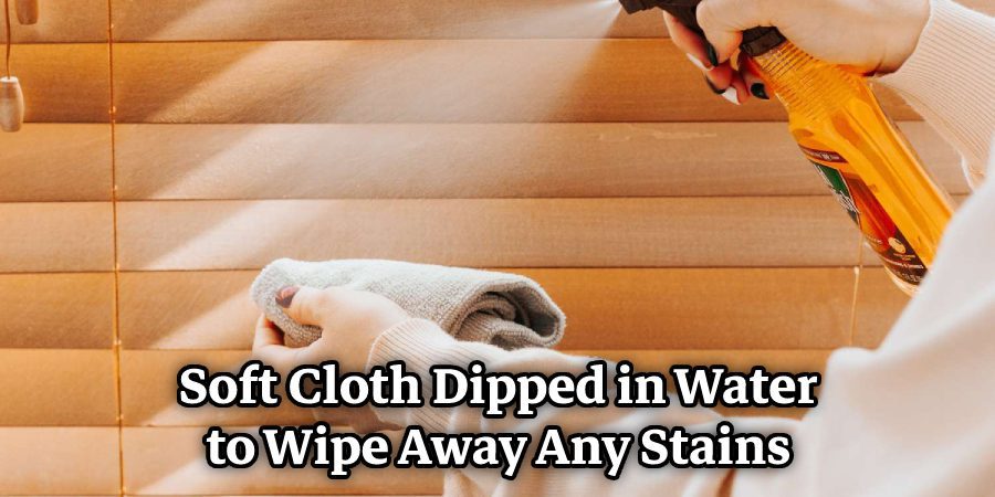 Soft Cloth Dipped in Water to Wipe Away Any Stains