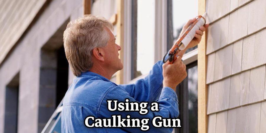 Using a caulking gun