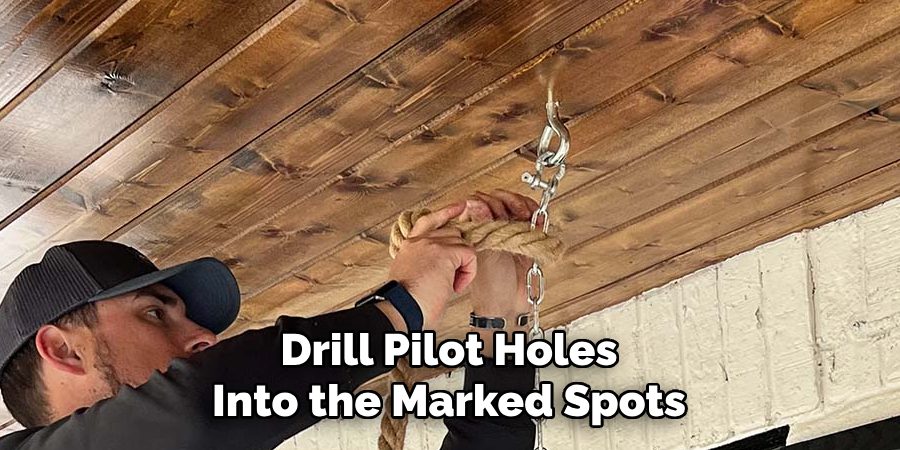 Drill Pilot Holes Into the Marked Spots