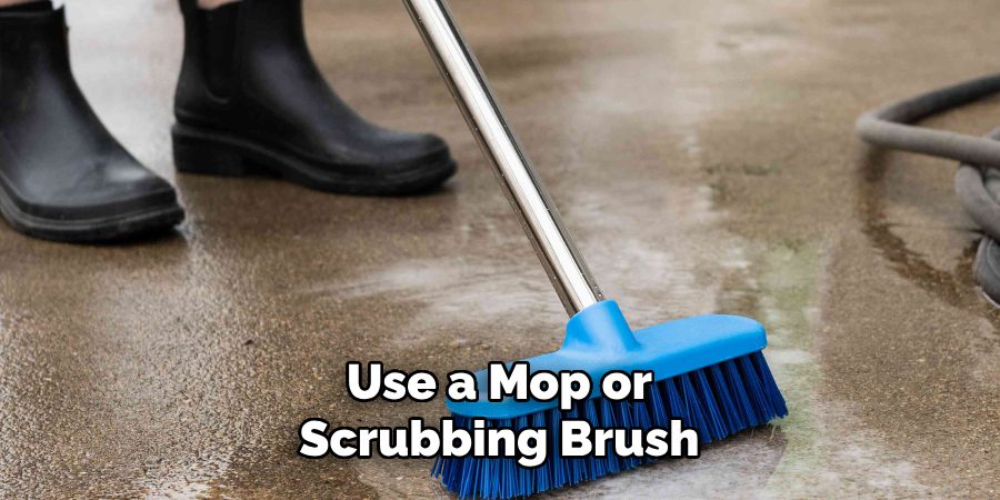 Use a Mop or Scrubbing Brush