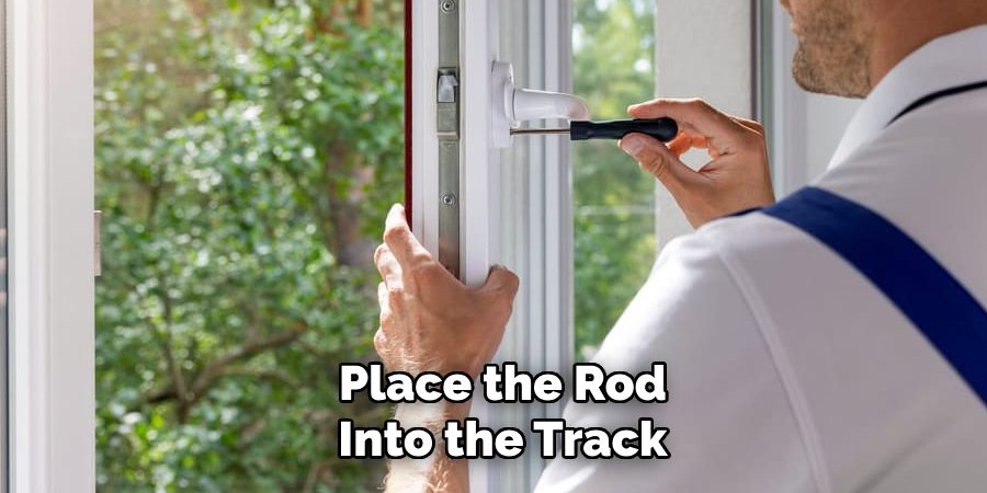 Place the Rod Into the Track
