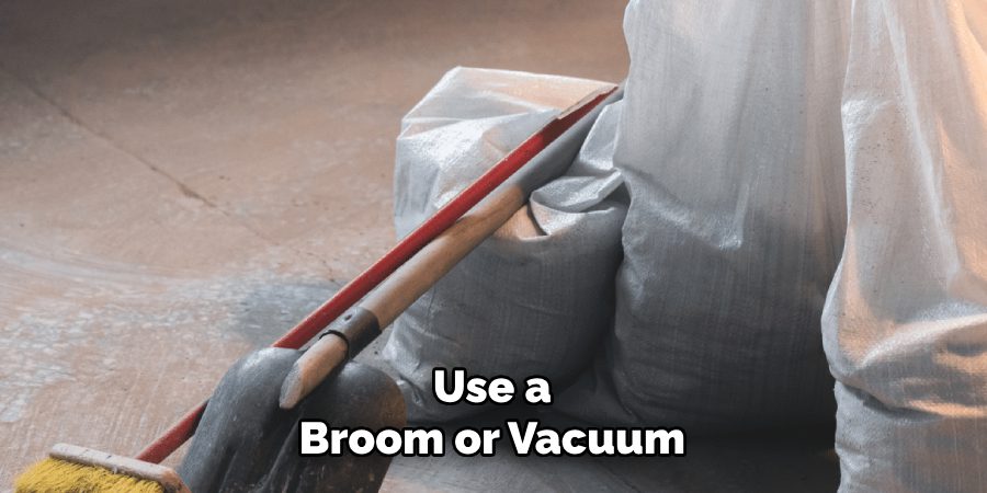 Use a Broom or Vacuum