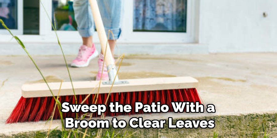 Sweep the Patio With a 
Broom to Clear Leaves